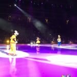 Goofy, Mickey, and Minnie Mouse ice skating