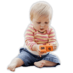 Toddler playing with cubes