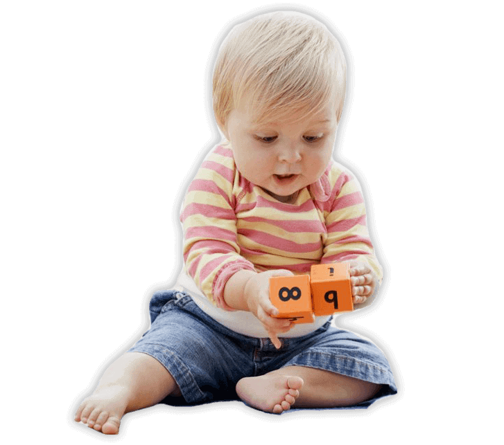 Toddler playing with cubes