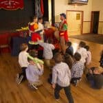 Clowns with group of kids