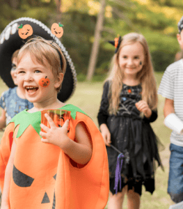 Kids in Halloween costumes
