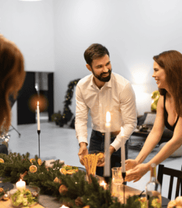 People setting up dinner table